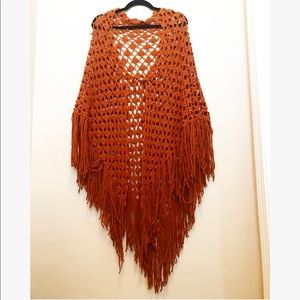 Brick colored poncho.